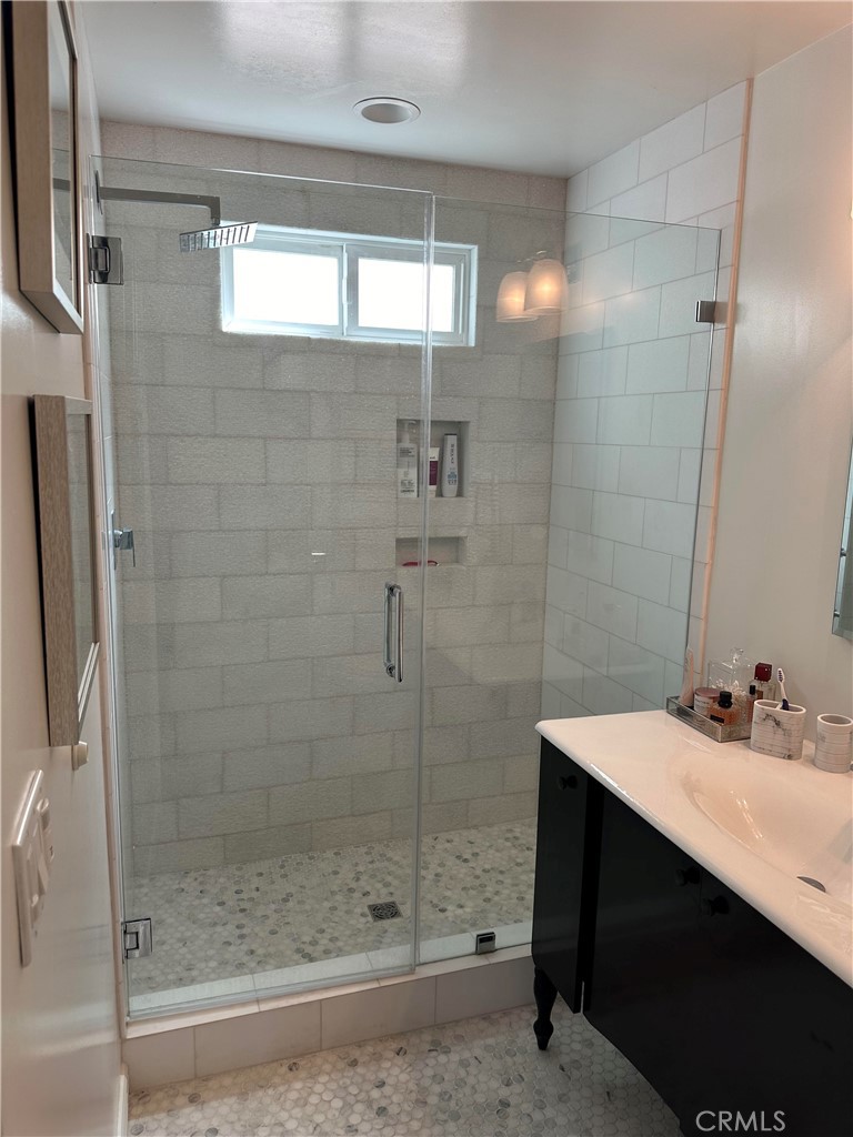 Spacious tile and glass shower - 577 Ramona A, Laguna Beach CA 92651 - photo 22