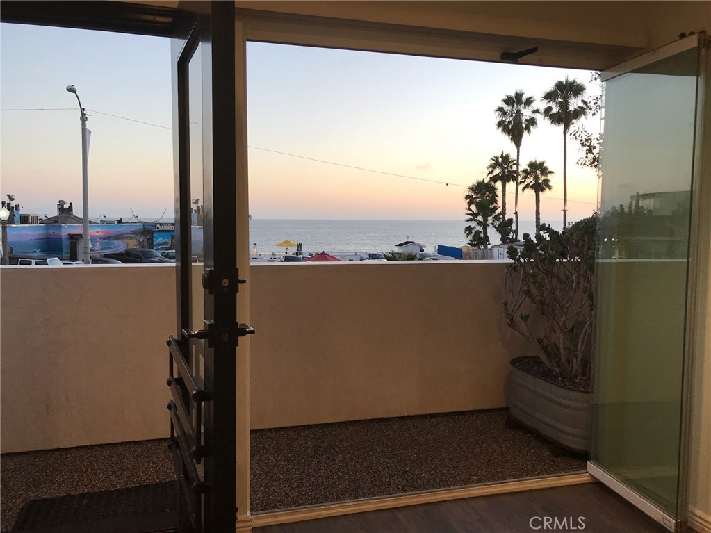 Front Door and 3-Part Glass Slider Window for Indoor/Outdoor Living onto Private Front Porch. - 577 Ramona Avenue D, Laguna Beach CA 92651 - photo 1