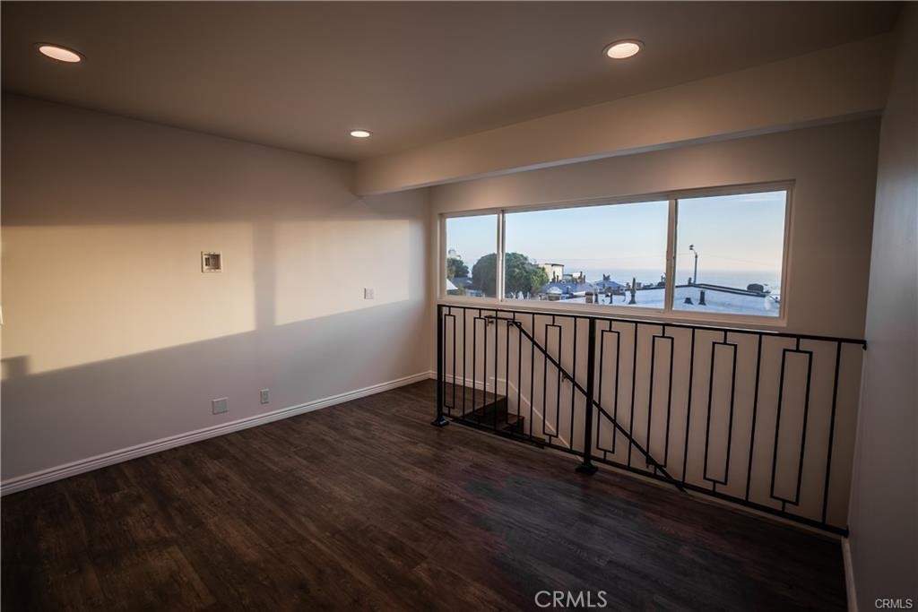 Twilight ocean views from front room - 577 S Ramona #E, Laguna Beach CA 92651 - photo 9
