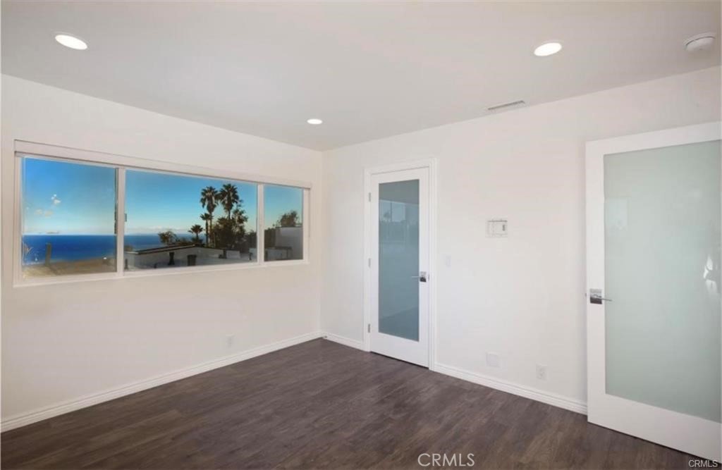 Second bedroom w/ walk-in closet - 577 S Ramona #E, Laguna Beach CA 92651 - photo 25