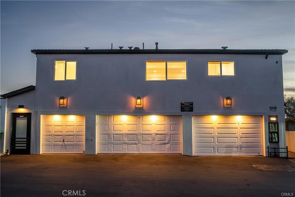 Center 2 car garage. The other 2 are storage only - 577 S Ramona #E, Laguna Beach CA 92651 - photo 32