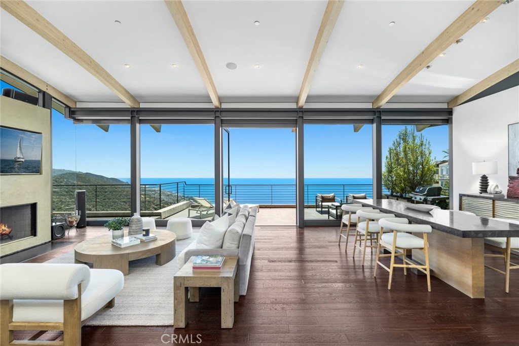 Retreat to a private world of luxury and breathtaking ocean and whitewater views at this spectacular custom home in Lagu - 591 Balboa Avenue, Laguna Beach CA 92651 - photo 1