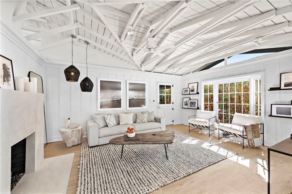 The stunning living room with fireplace - 592 Bluebird Canyon Drive, Laguna Beach CA 92651 - photo 1