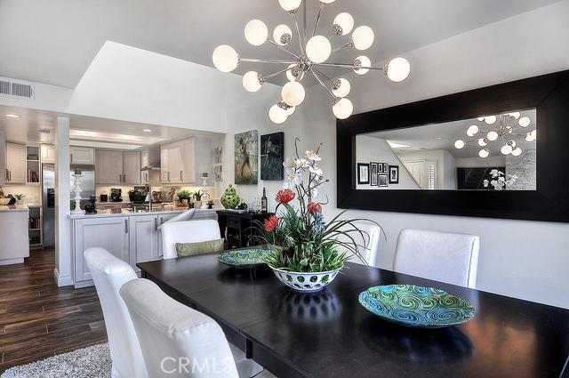 Open dining area to kitchen. - 606 San Nicholas Court, Laguna Beach CA 92651 - photo 1