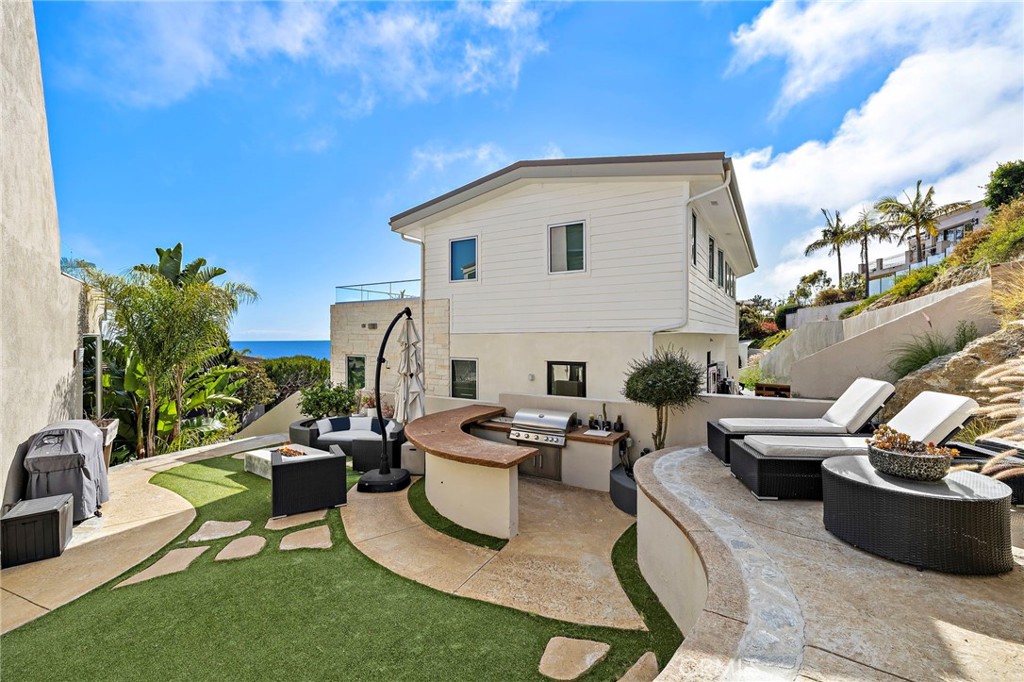 digitally staged with lounge cushions - 608 Loretta Drive, Laguna Beach CA 92651 - photo 4