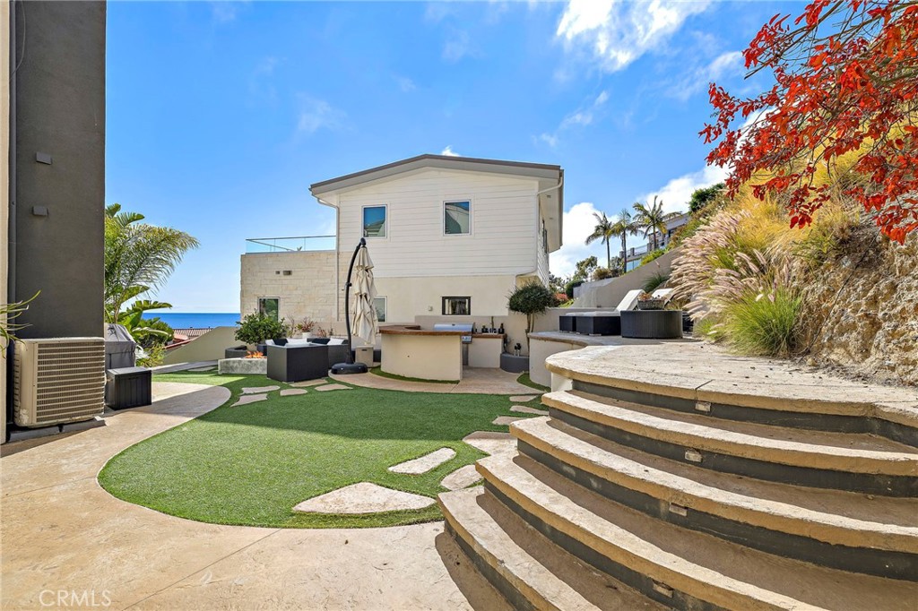 digitally staged with lounge cushions - 608 Loretta Drive, Laguna Beach CA 92651 - photo 5