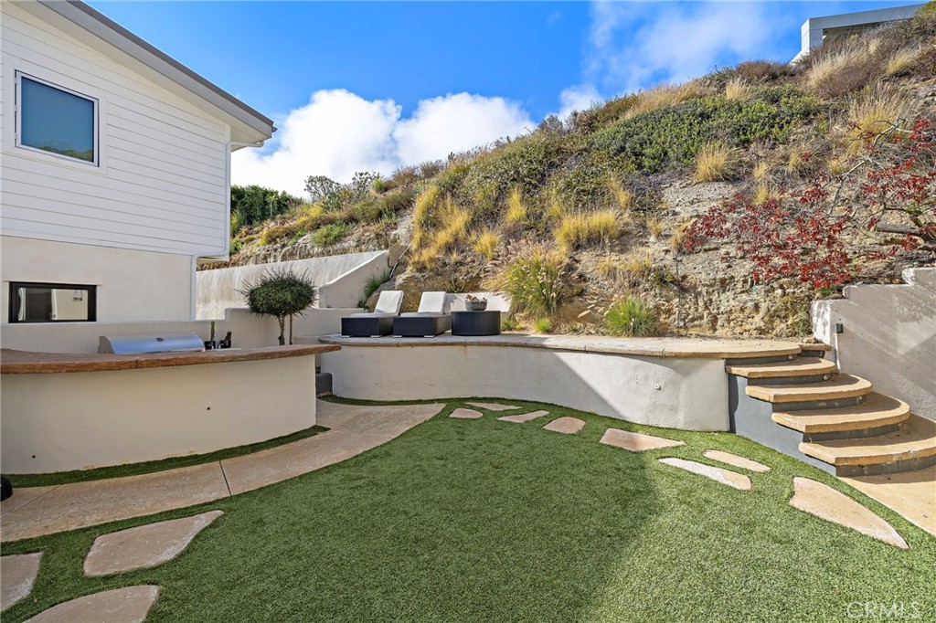 digitally staged with lounge cushions - 608 Loretta Drive, Laguna Beach CA 92651 - photo 6