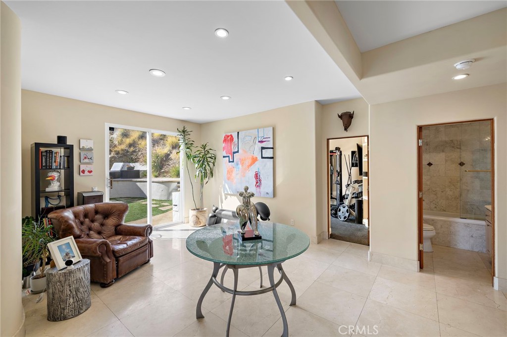 lower level lounge space with side yard access - 608 Loretta Drive, Laguna Beach CA 92651 - photo 40