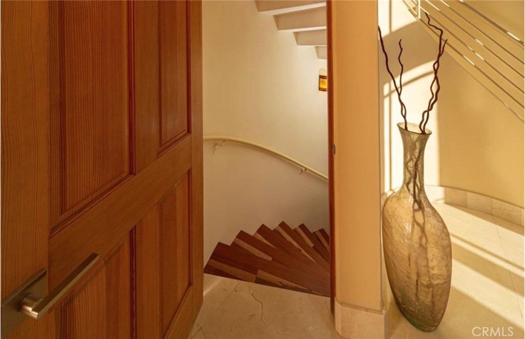 hardwood stairs leading to laundry & utility/storage - 608 Loretta Drive, Laguna Beach CA 92651 - photo 41