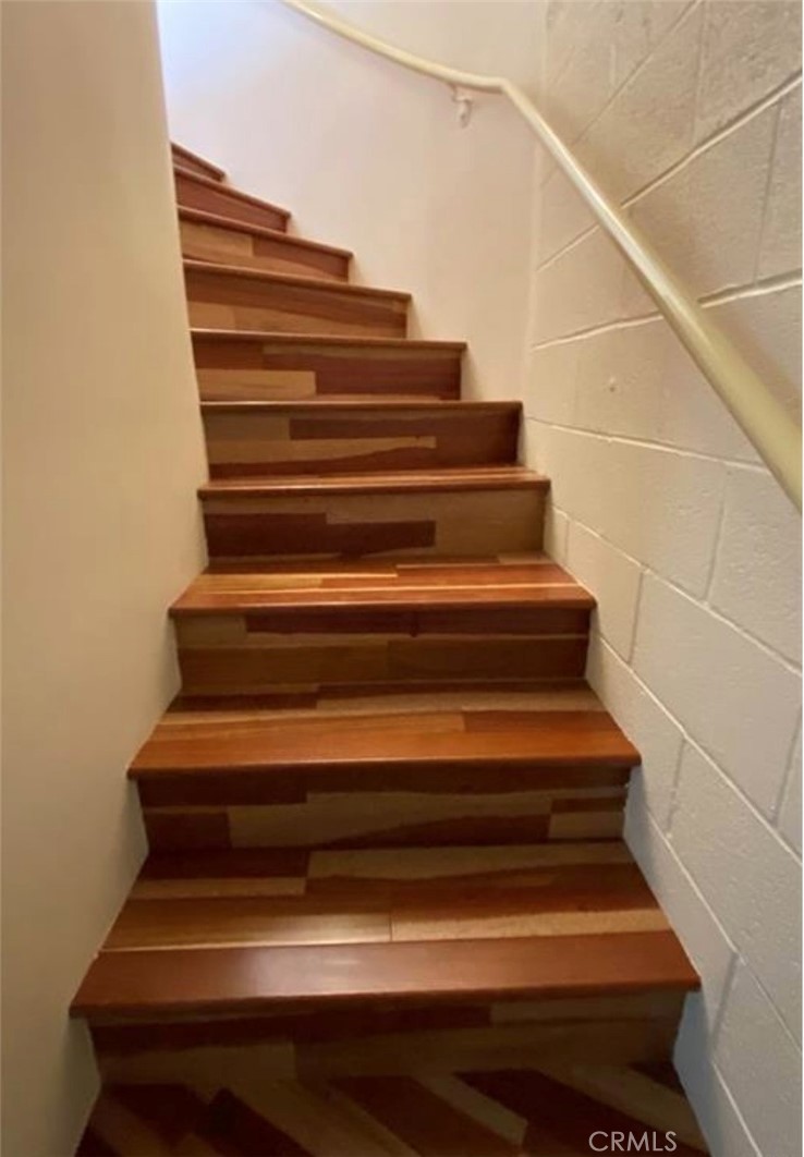 stairs leading down to garage level interior laundry & utility/storage area - 608 Loretta Drive, Laguna Beach CA 92651 - photo 42