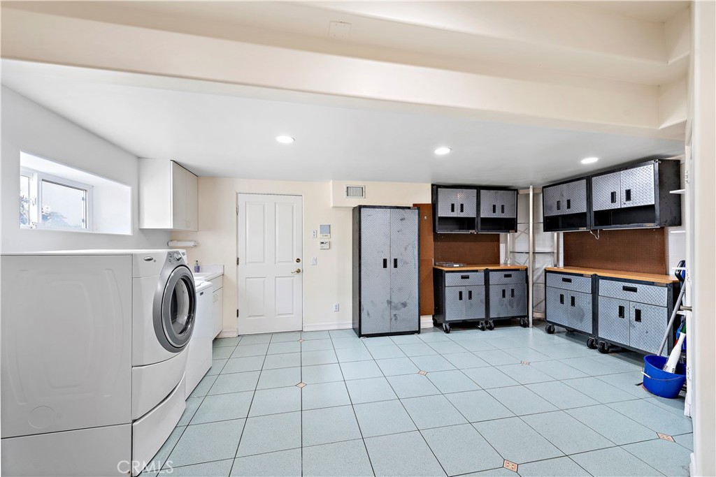 spacious garage level interior laundry & utility/storage area - 608 Loretta Drive, Laguna Beach CA 92651 - photo 43