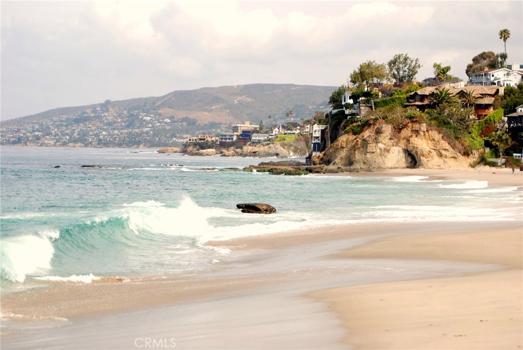 LOOKING TOWARDS VICTORIA BEACH AND DOWNTOWN LAGUNA FROM BLUE LAGOON BEACH - 61 Blue Lagoon, Laguna Beach CA 92651 - photo 1