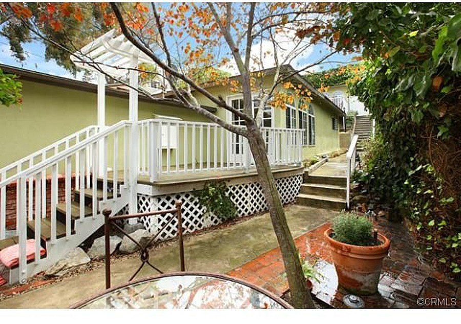 Private entrance and patio area for front cottage. This property is currently tenant occupied although photos show when - 635 Saint Anns Drive, Laguna Beach CA 92651 - photo 1