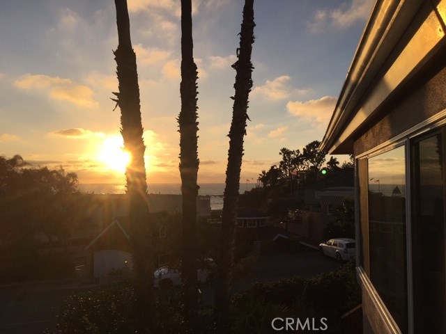Sunset view from your front porch. - 650 Cliff Drive A, Laguna Beach CA 92651 - photo 1
