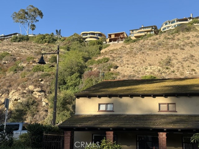 The house is a landmark and almost keeps an eye on City Hall below! - 664 Mystic View, Laguna Beach CA 92651 - photo 8
