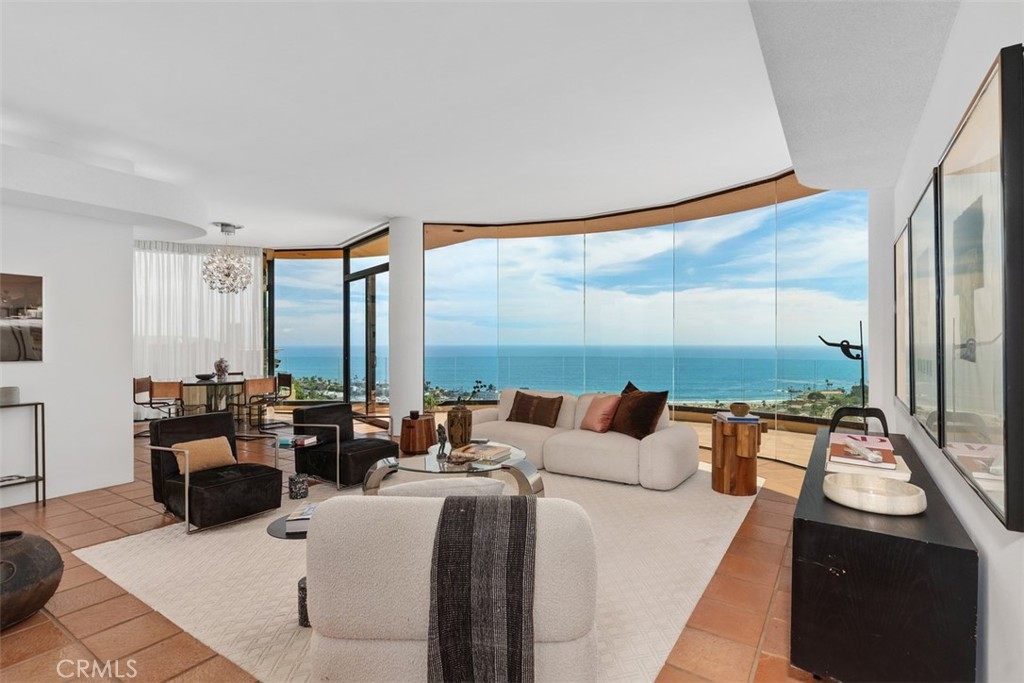 Living room with walls of glass for constant views. - 664 Mystic View, Laguna Beach CA 92651 - photo 18