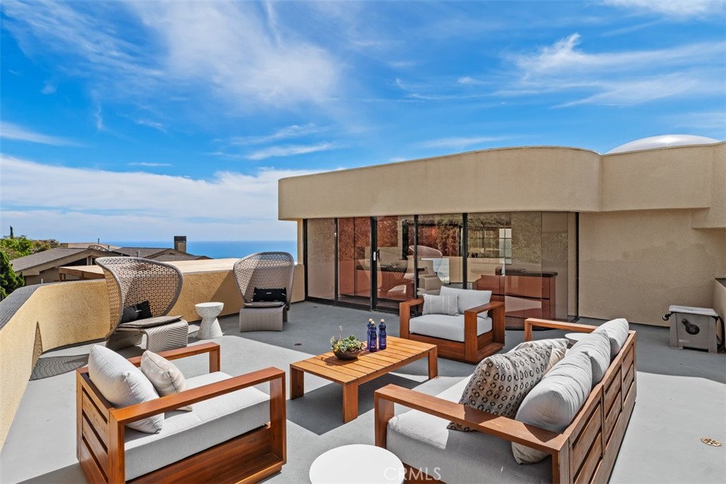 Upper deck over garage is large and great place to have a barbecue. - 664 Mystic View, Laguna Beach CA 92651 - photo 29