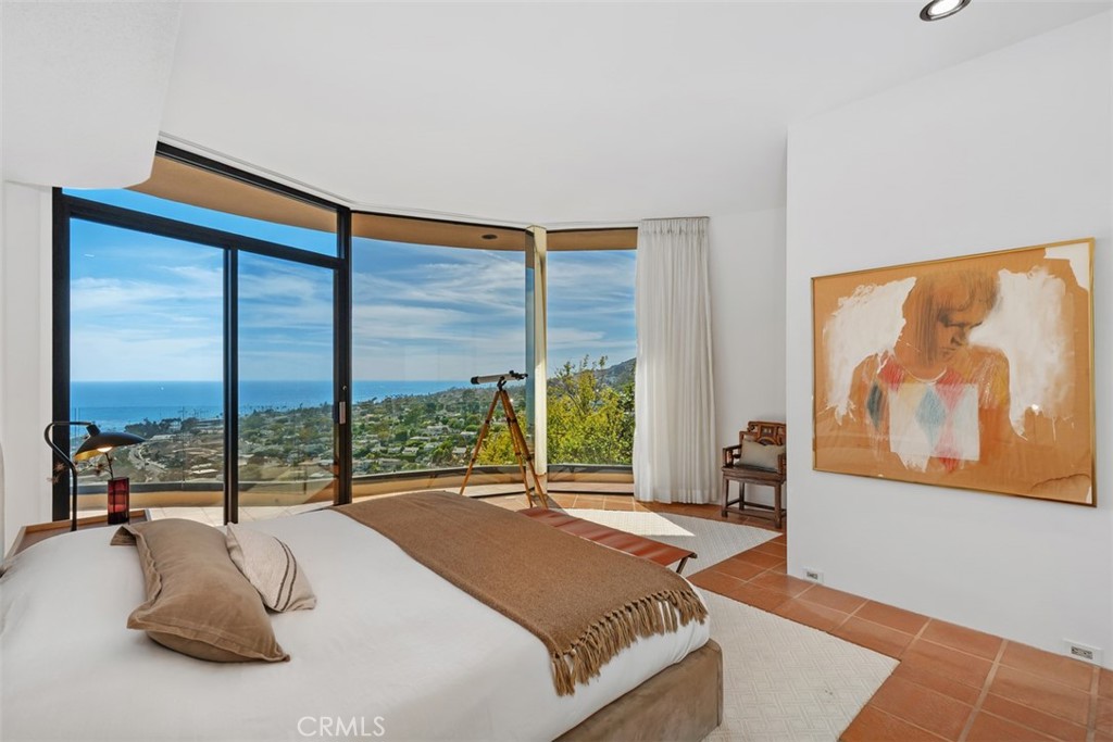 Primary bedroom on top level has access to deck and views to enjoy day and night. - 664 Mystic View, Laguna Beach CA 92651 - photo 30