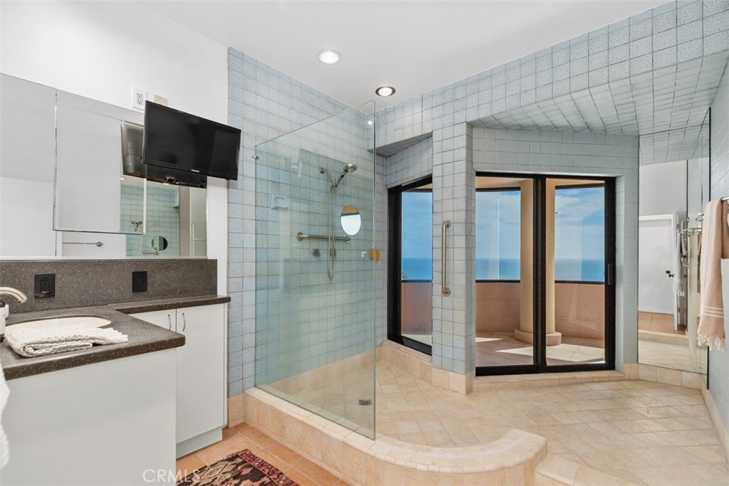 Second level bathroom has large shower and slider to outside. - 664 Mystic View, Laguna Beach CA 92651 - photo 41