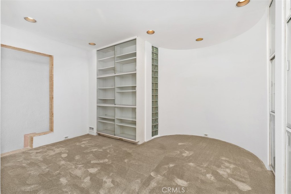 Bonus room on second level, could be library as has many shelves with glass doors. - 664 Mystic View, Laguna Beach CA 92651 - photo 43