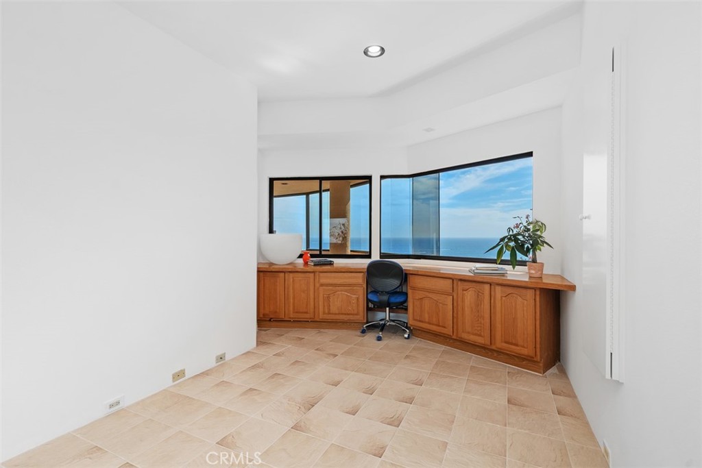 Second level possible 3rd bedroom, used as craft room but has closet with mirrored doors and gorgeous views. - 664 Mystic View, Laguna Beach CA 92651 - photo 44