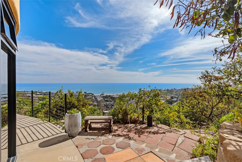 Lower level has many walkways going down to terraced backyard filled with fruit trees. - 664 Mystic View, Laguna Beach CA 92651 - photo 53