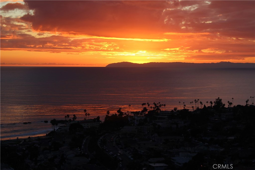Sunsets and sunrises are simply amazing; the coastline and city are spread out in front of you! - 670 Vista Lane, Laguna Beach CA 92651 - photo 1