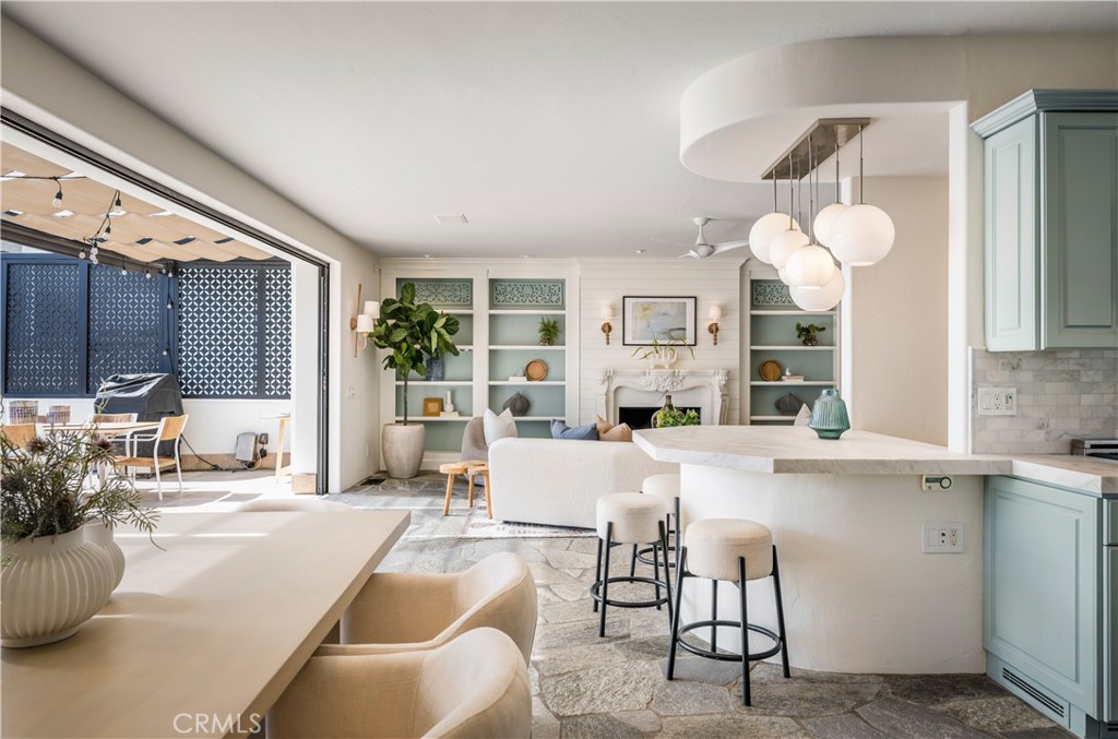 Dual dining areas in the kitchen - 675 Cliff Drive, Laguna Beach CA 92651 - photo 8