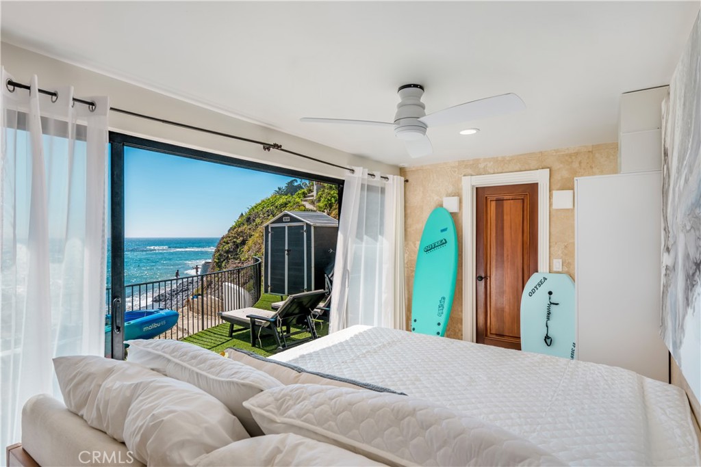 Lowest level bedroom with a kitchenette and bathroom - 675 Cliff Drive, Laguna Beach CA 92651 - photo 30