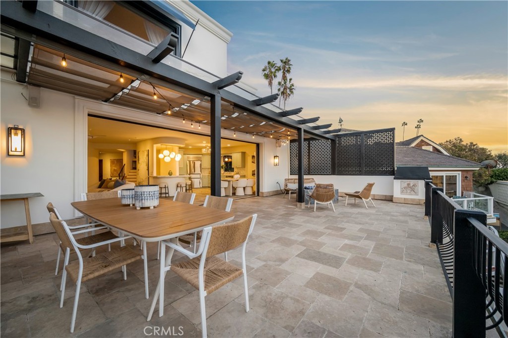 Living room deck at sunset - 675 Cliff Drive, Laguna Beach CA 92651 - photo 43