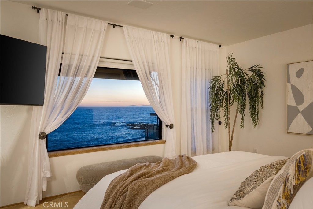 Sunset from the primary bedroom - 675 Cliff Drive, Laguna Beach CA 92651 - photo 44