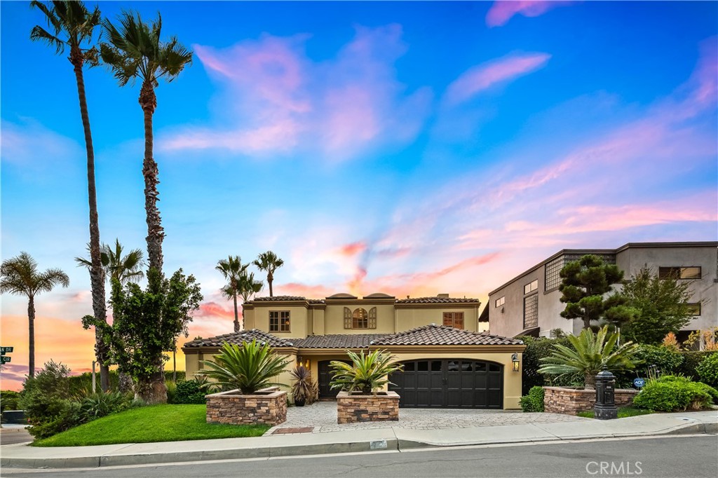 733 Pelican Drive is located on a flat corner lot in the Idyllic Portafina area of Laguna Beach. - 733 Pelican Drive, Laguna Beach CA 92651 - photo 1
