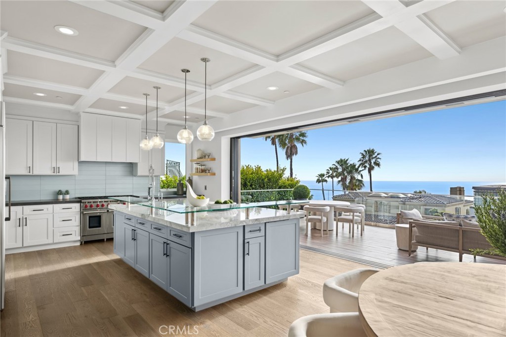 Walls of slideaway glass doors open this level to a generous heated deck where friends and loved ones will savor ever-ch - 739 Marlin, Laguna Beach CA 92651 - photo 1