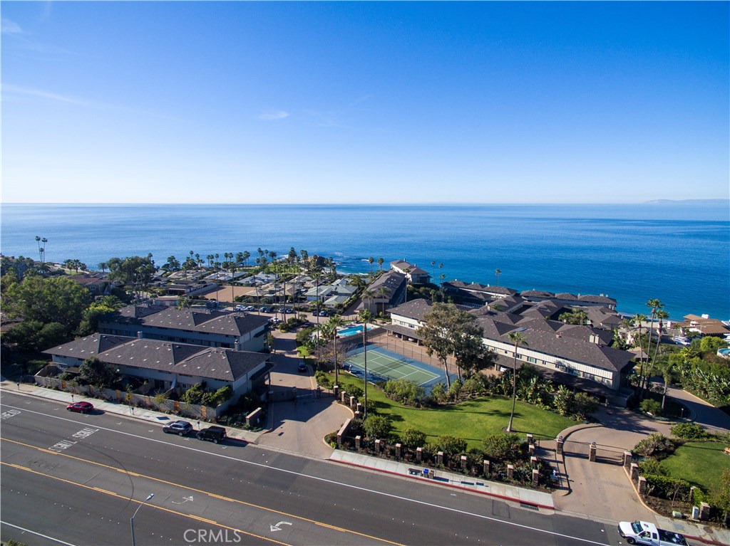 AERIAL VIEW OF THE VILLAS AT BLUE LAGOON SHOWING PRIVATE TENNIS COURT - 74 Blue Lagoon, Laguna Beach CA 92651 - photo 1