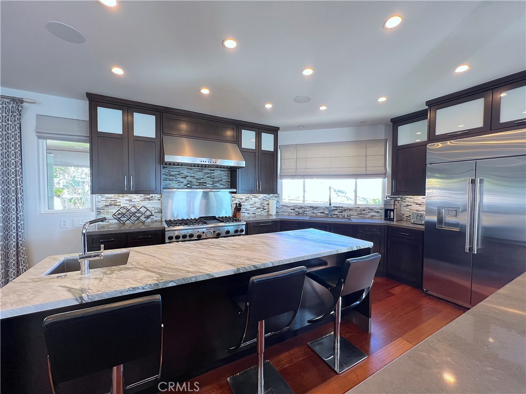 Spacious kitchen with high end stainless steel appliances. - 750 Bolsana Drive, Laguna Beach CA 92651 - photo 28