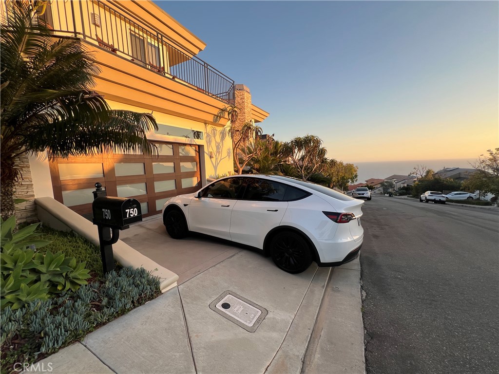 Tesla charging station in the garage. - 750 Bolsana Drive, Laguna Beach CA 92651 - photo 55