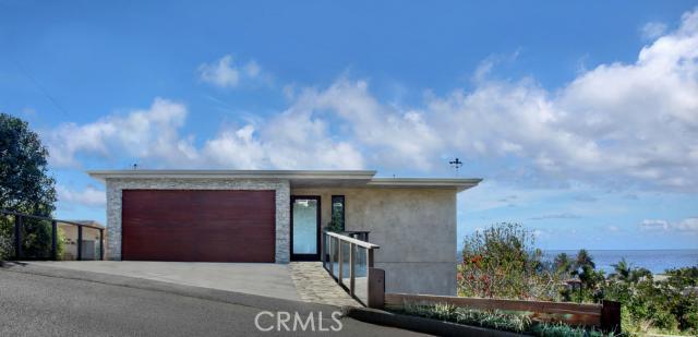 Situated in a desirable location with a rare combination of ocean view and walking distance to Laguna Village shops, bea - 756 Bluebird Canyon Drive, Laguna Beach CA 92651 - photo 1