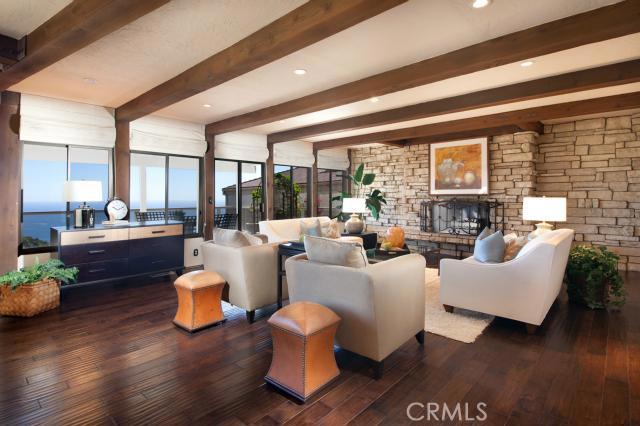Spacious main living room with fireplace, ocean view. - 765 Kendall Drive, Laguna Beach CA 92651 - photo 1