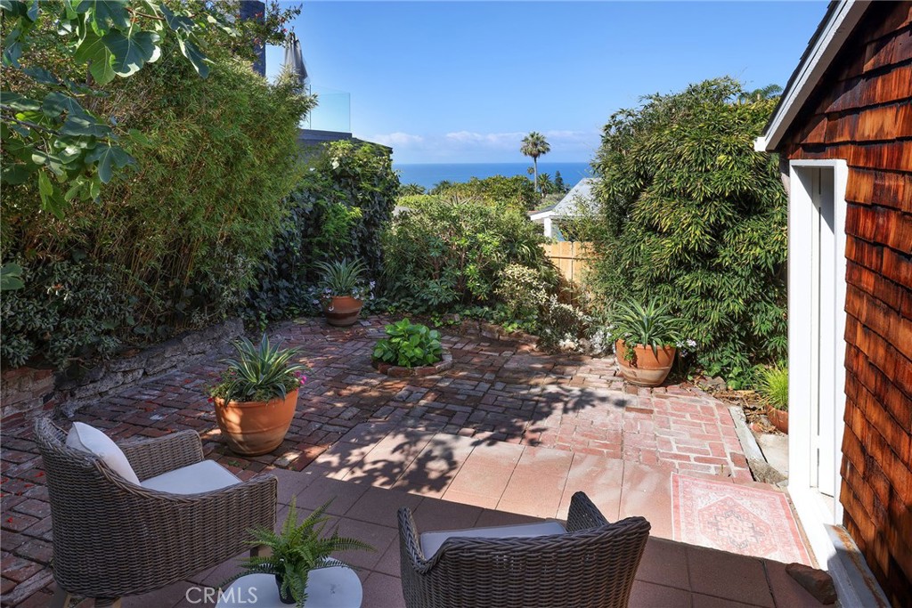 Patio off of primary and second bedrooms - 769 Manzanita Drive, Laguna Beach CA 92651 - photo 18