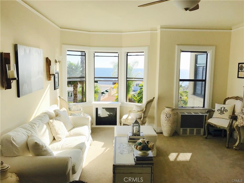 Living Room w/ ocean view - 770 Hillcrest Drive 8, Laguna Beach CA 92651 - photo 1