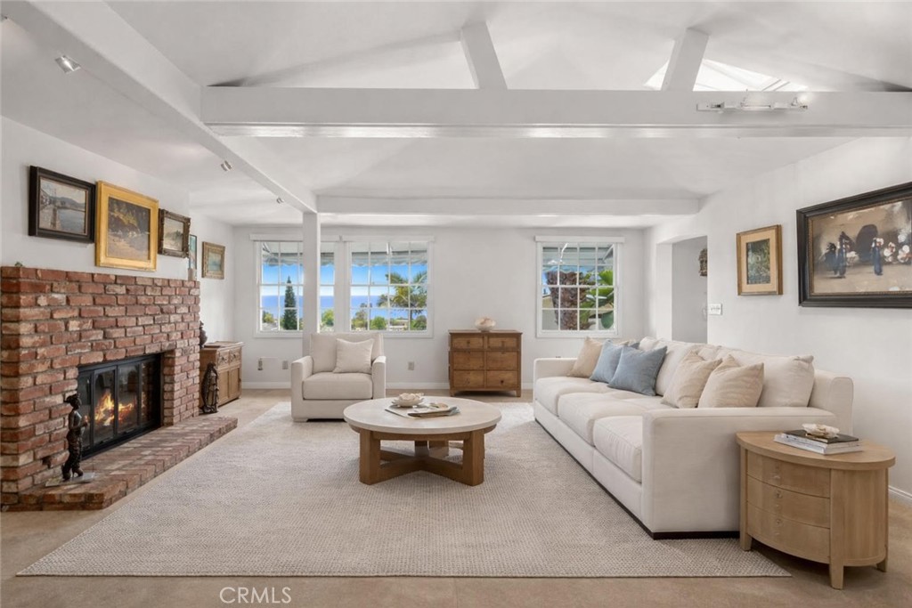 The property beautifully combines classic architectural character with modern comforts. Offering four bedrooms and three - 790 Wendt Terrace, Laguna Beach CA 92651 - photo 1