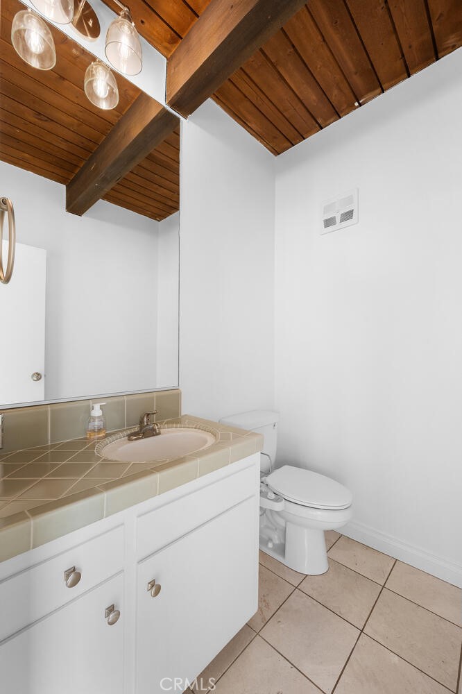 Half bath on the main living level. - 815 La Mirada Street, Laguna Beach CA 92651 - photo 21