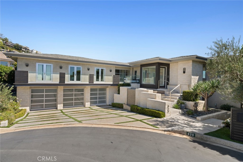 Encompassing approximately 5,875 square feet on an expansive 10,260 square foot homesite, the residence showcases refine - 820 Emerald Bay, Laguna Beach CA 92651 - photo 6