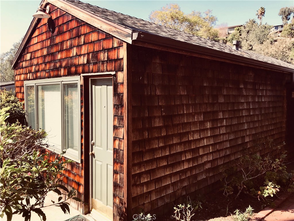Studio Apartment with private entrance. Carport in front of unit. - 834 Bluebird Canyon Drive, Laguna Beach CA 92651 - photo 1
