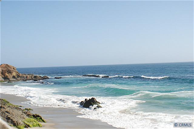 SPECTACULAR OCEAN VIEWS OF TREASURE ISLAND FROM LIVING ROOM - 91 BLUE LAGOON, Laguna Beach CA 92651 - photo 1