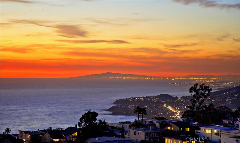 NIGHT VIEW FROM LIVING ROOM, PALOS VERDES IN BACKGROUND, AMAZING PANORAMCIC VIEWS - 920 Quivera Street, Laguna Beach CA 92651 - photo 1