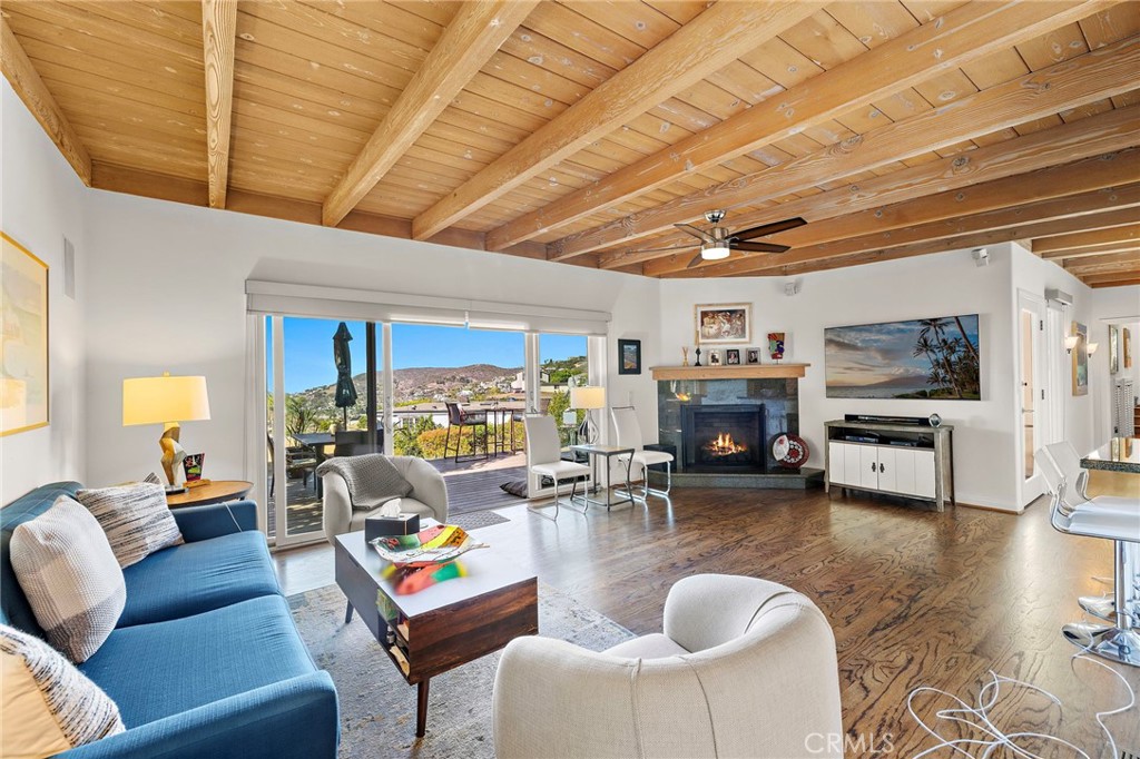 Living room with beautiful real wood floors - 930 Canyon View Drive, Laguna Beach CA 92651 - photo 13