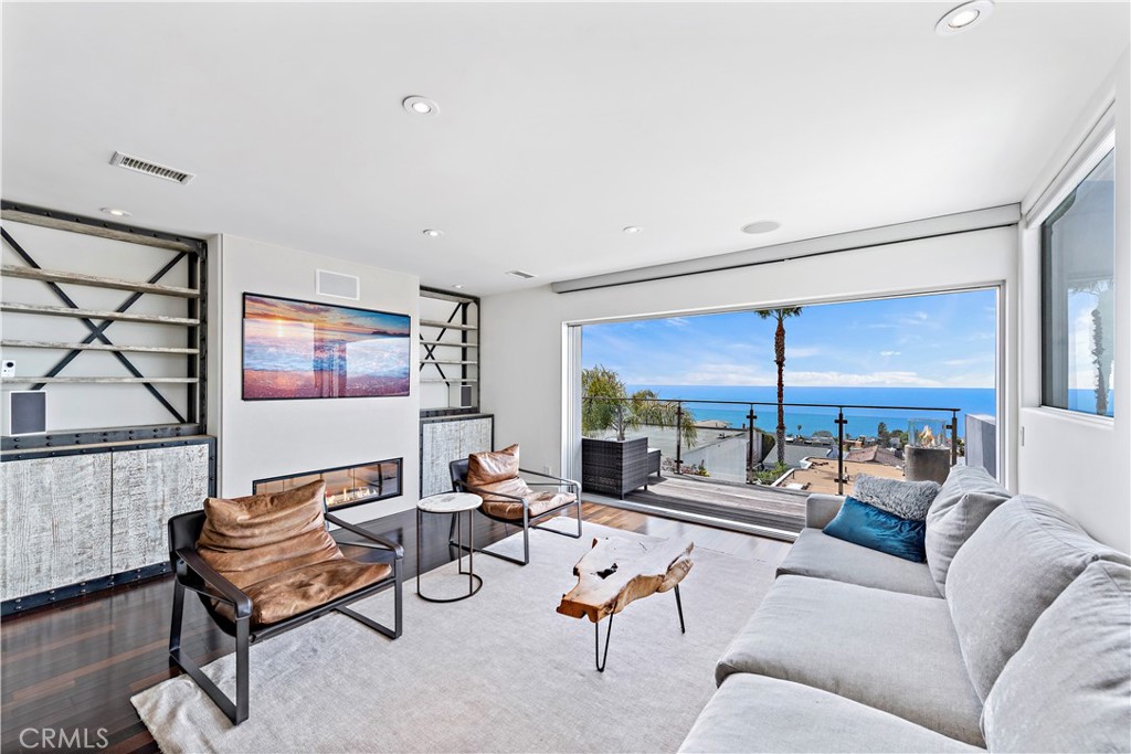 This home has it all - tasteful design, quality finishes, and gorgeous, sit-down ocean views! - 971 Santa Ana Street, Laguna Beach CA 92651 - photo 1