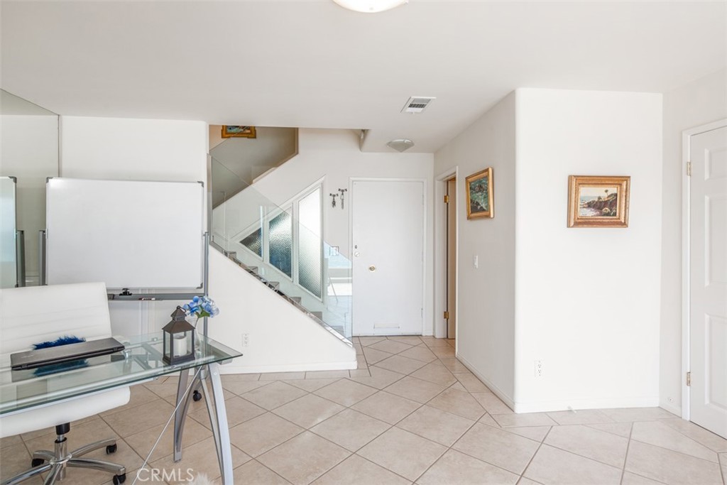 Entry / lowest level can be used as an office area - 99 Blue Lagoon, Laguna Beach CA 92651 - photo 16
