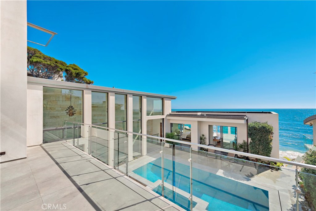 Top level view deck outside of guest bedrooms. - 992 Ocean Front, Laguna Beach CA 92651 - photo 1